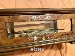 Reuge 3/72 beveled glass and wood music box, numbered and signed by the artist