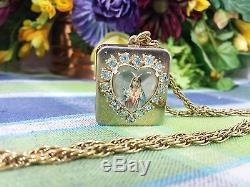 Reuge Miniature Mary mother of Jesus Music box Musical gold tone Pendant