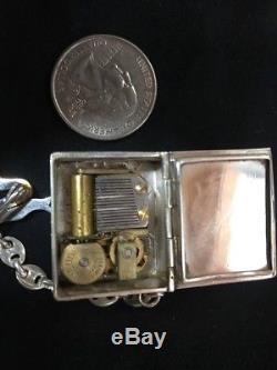 Reuge Miniature Music Box Book
