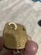 Reuge Swiss-made music box pendant with an ornate gold-plated blue cameo front