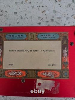 Reuge, glass cased, music box, made in Switzerland. In good condition