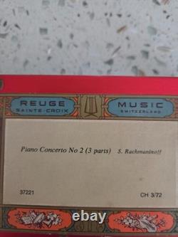 Reuge, glass cased, music box, made in Switzerland. In good condition