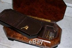 Reuge music box 36 note jewelry box new in the box. Inlay piopppo wood. Swiss