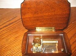Reuge music box & Italian marquetry inlay of musical instruments on Burl Wood