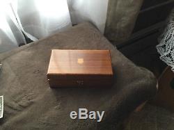Reuge music box made in Switzerland 4 3/4 X 8 excellent condition plays Tristes