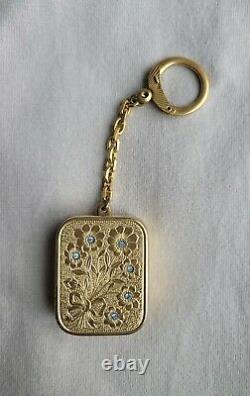 VINTAGE Reuge Swiss Made Music Box Key Chain. Gold tone, Flowers with Blue Gems
