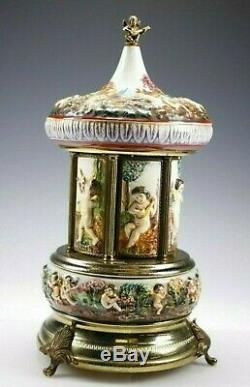 Vintage Capodimonte Reuge Porcelain Cherub Carousel Tobacco Cigarette Music Box