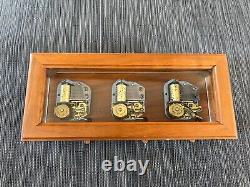 Vintage REUGE Three song hardwood music box. Swiss musical movements under glass
