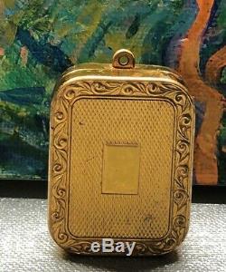Vintage Swiss Made Gold Tone Reuge Ste-Croix Wind Up Music Box Keychain Pendant