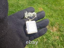 Vintage Swiss Reuge Miniature Music Box Gold Tone Case Musical Brooch