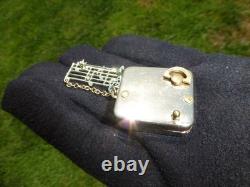 Vintage Swiss Reuge Miniature Music Box Gold Tone Case Musical Brooch