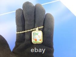 Vintage Swiss Reuge Miniature music box pendant Gold Gilt / Sterling Silver Case