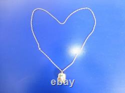 Vintage Swiss Reuge Miniature music box pendant Gold Gilt / Sterling Silver Case