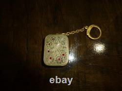 Vintage Swiss Reuge Miniature music box pendant, Key Chain, Ruby Stones Front