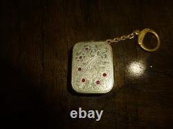 Vintage Swiss Reuge Miniature music box pendant, Key Chain, Ruby Stones Front