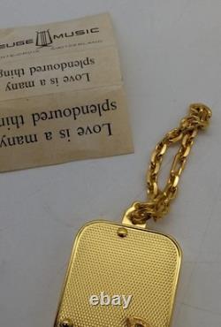 Vtg Reuge Swiss Gold Keychain Mini Music Box Love is a Many Splendoured Thing